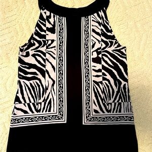 Black& White pull over sleeveless top 14-16 (42”) very nice condition